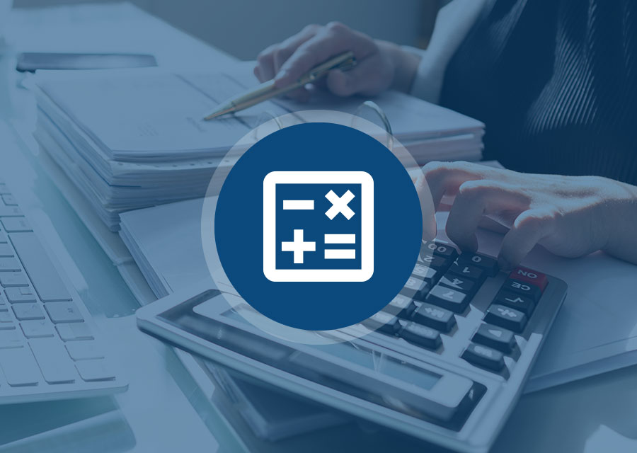 desk with calculator and documents